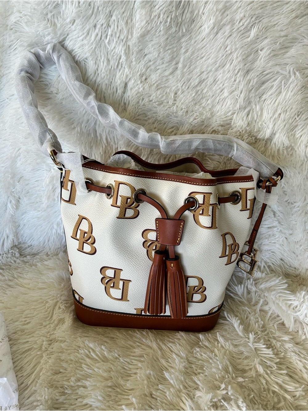 Dooney & Bourke White Canvas DB Logo Bucket Bag with Brown Trim